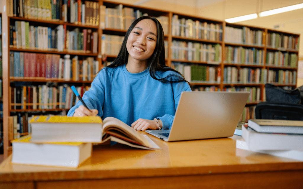 A happy college student, showing effective student account recovery without harming enrollment.