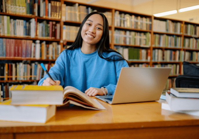 A happy college student, showing effective student account recovery without harming enrollment.